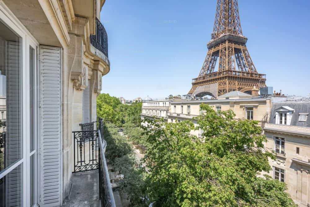 An apartment looks out over the Eiffel Tower